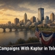 Fostoria News Toledo skyline at sunset with American flags and patriotic decorations.